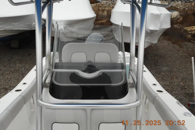 Slide: The Image of 2021 Sea Fox 228 Commander boat with center console and protective cover. - 12