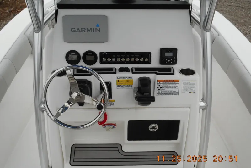 Slide: The Image of 2021 Sea Fox 228 Commander boat console with Garmin navigation system and steering wheel. - 7
