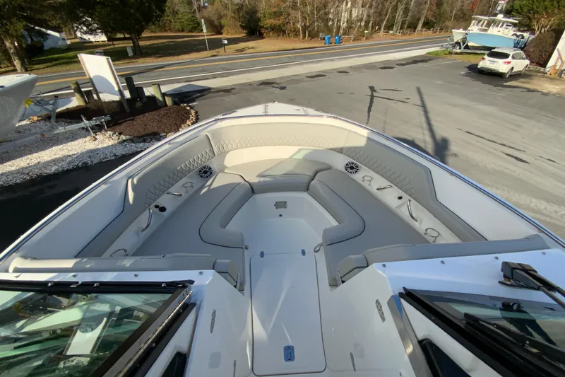 Slide: The Image of 2026 Pursuit DC 326 Dual Console boat with spacious seating and modern design. - 32