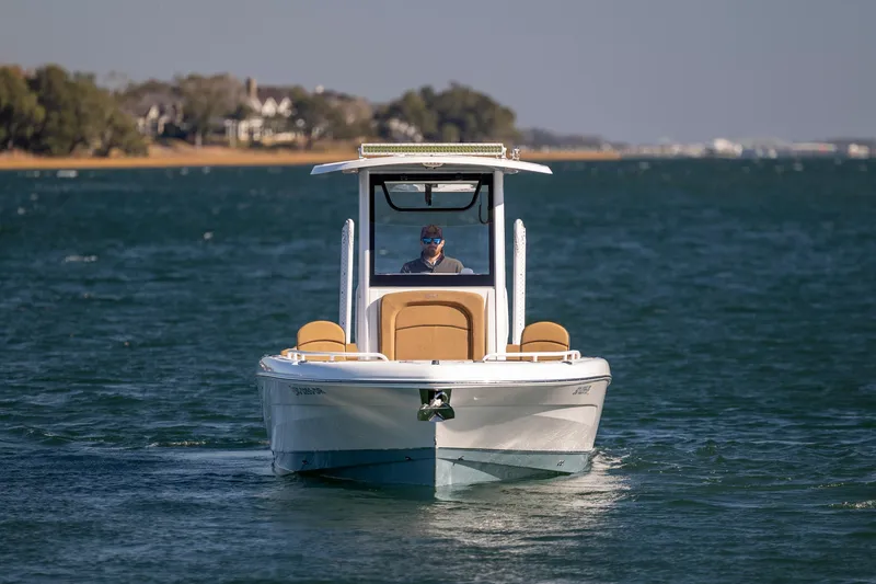 Slide: The Image of 2021 Sea Hunt Escape 27 boat cruising on a sunny day. - 6