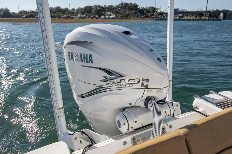 Slide: The Image of Yamaha XTO Offshore engine on 2021 Sea Hunt Escape 27 boat in water. - 9