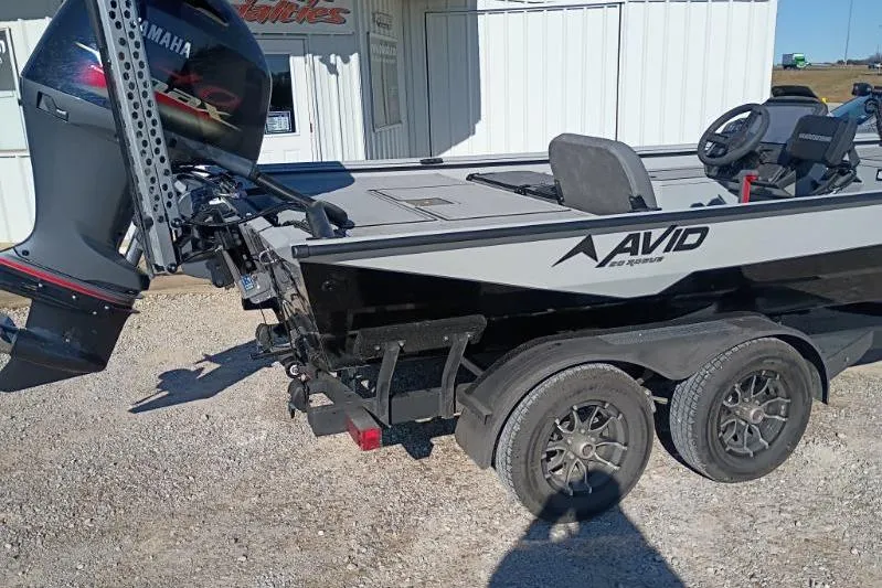 Slide: The Image of Avid 20 Rogue SC 2025 boat with Yamaha motor on a trailer. - 4