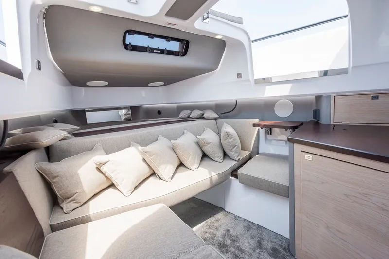 Slide: The Image of Luxurious interior of 2026 Axopar 45 XC Cross Cabin with plush seating and modern design. - 30