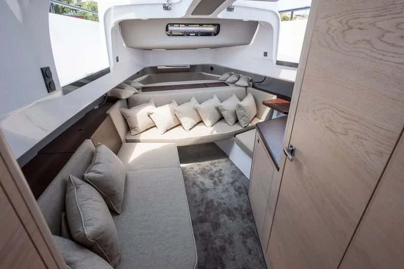 Slide: The Image of Luxurious interior of 2026 Axopar 45 XC Cross Cabin with plush seating and modern design. - 29