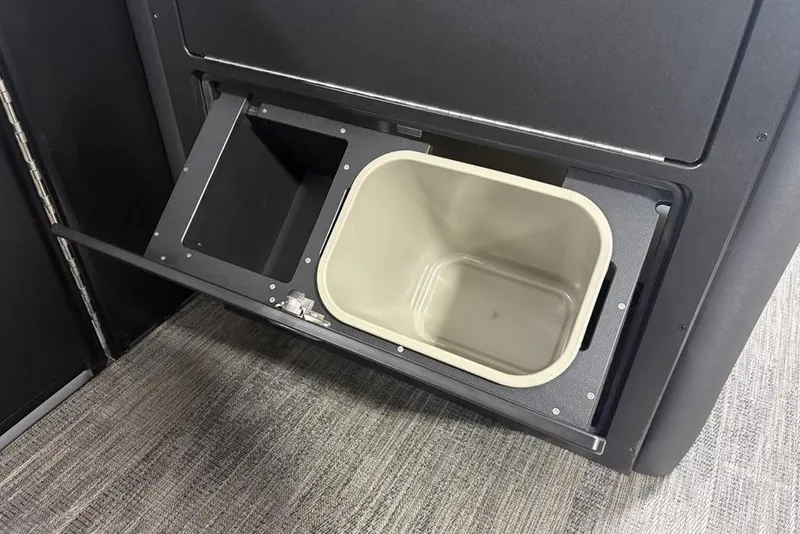 Slide: The Image of Built-in storage compartment on 2025 Godfrey AquaPatio 235 DFL boat. - 15