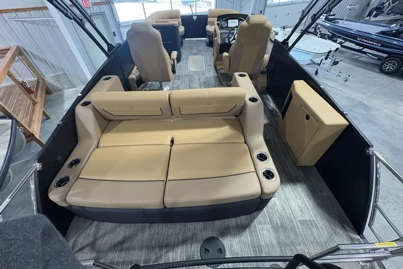 Slide: The Image of 2025 Godfrey AquaPatio 235 DFL interior with tan seating and modern design. - 32