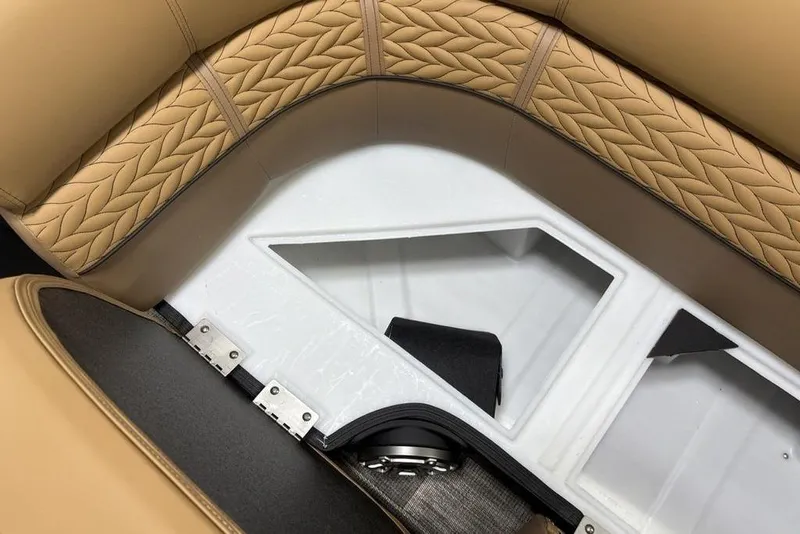 Slide: The Image of Luxurious tan seating and storage on 2025 Godfrey AquaPatio 235 DFL boat. - 7