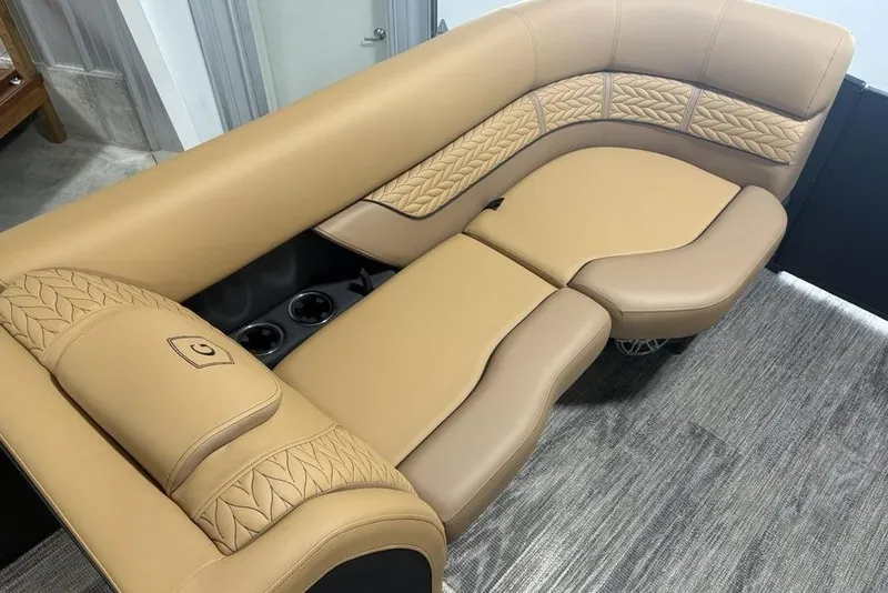 Slide: The Image of Luxurious tan seating on 2025 Godfrey AquaPatio 235 DFL pontoon boat. - 9