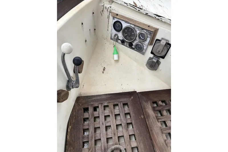 Slide: The Image of Control panel of a 1980 Tanton Sailboat with speed, depth, and angle gauges. - 16