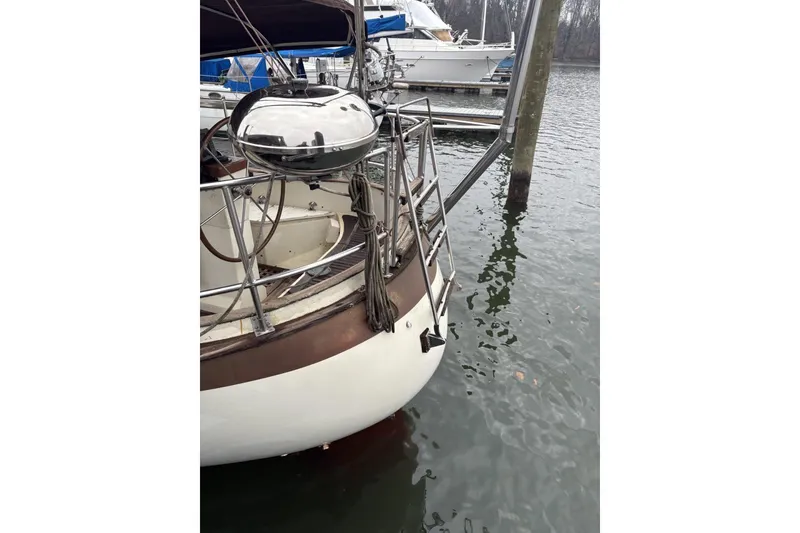 Slide: The Image of 1980 Tanton sailboat deck with mast and rigging details. - 21