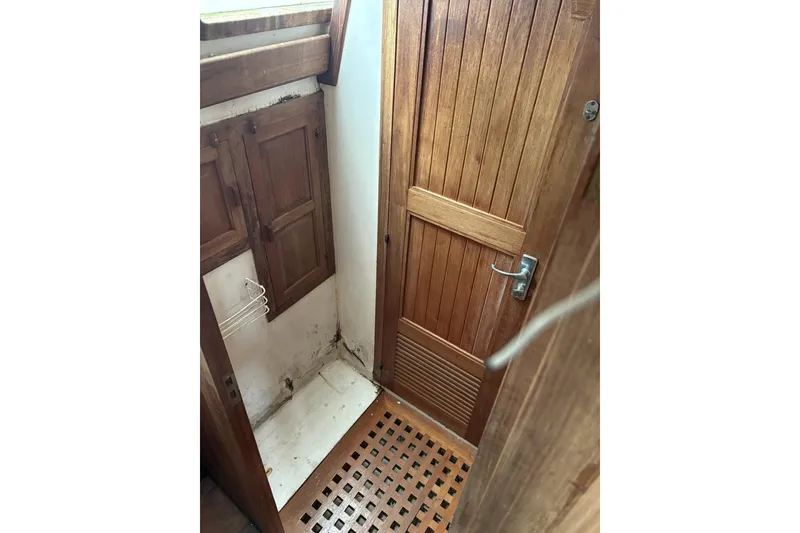 Slide: The Image of Electrical panel on a 1980 Tanton Sailboat with various switches and meters. - 8