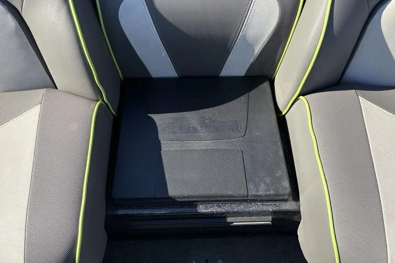 Slide: The Image of 2018 Skeeter ZX225 boat seat with gray upholstery and green accents. - 21