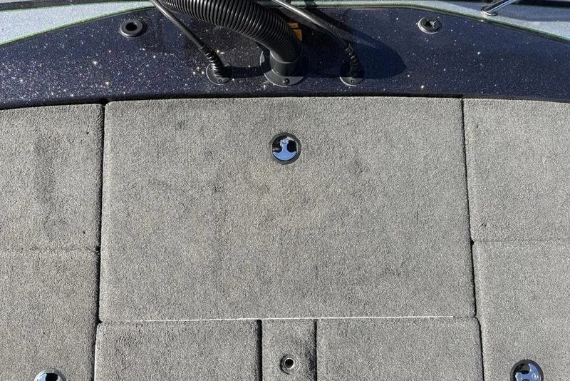 Slide: The Image of 2018 Skeeter ZX225 boat deck with gray carpet and fittings. - 32