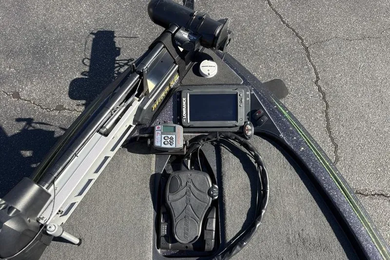 Slide: The Image of 2018 Skeeter ZX225 boat dashboard with Lowrance electronics and trolling motor. - 7