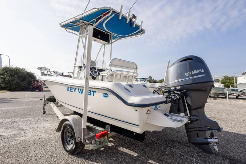 Slide: The Image of 2004 Key West 186 Center Console boat with Yamaha engine on trailer. - 12