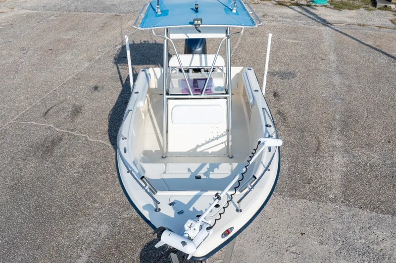 Slide: The Image of 2004 Key West 186 Center Console boat with blue canopy, viewed from above. - 8