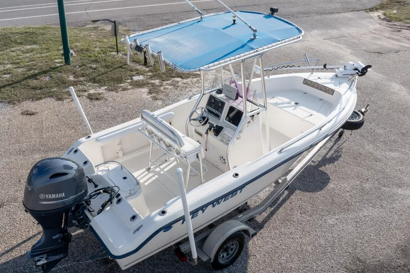 Slide: The Image of 2004 Key West 186 Center Console boat with Yamaha motor on trailer. - 9