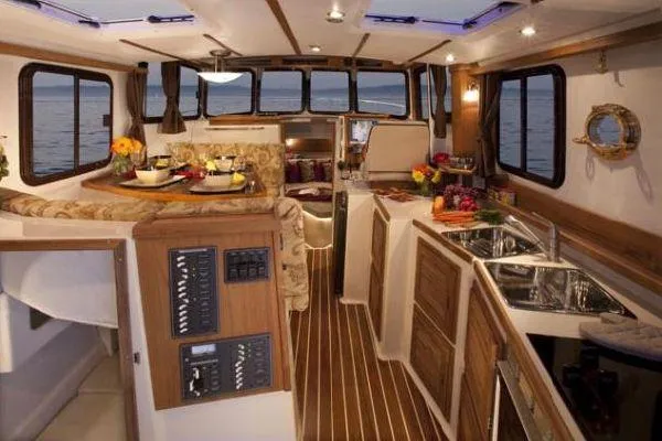 Slide: The Image of Interior of 2010 Ranger Tugs R-29 yacht with elegant furnishings. - 15