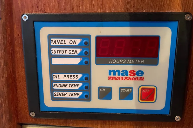Slide: The Image of Control panel of a 2010 Ranger Tugs R-29 with Mase generator display. - 31