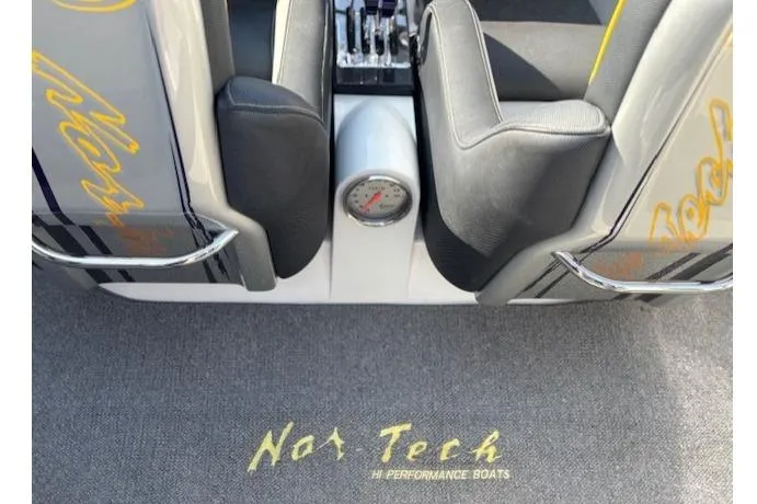Slide: The Image of 2008 Nor-Tech 3600 Supercat interior with branded carpet and seating. - 27