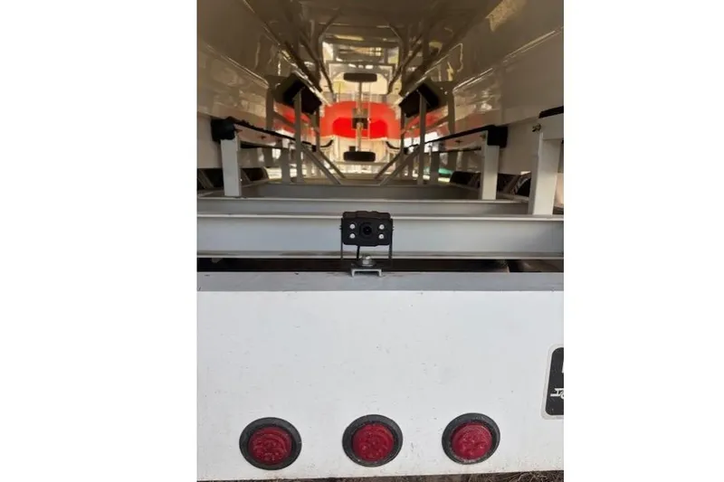 Slide: The Image of 2008 Nor-Tech 3600 Supercat trailer interior with red lights and structural supports. - 43
