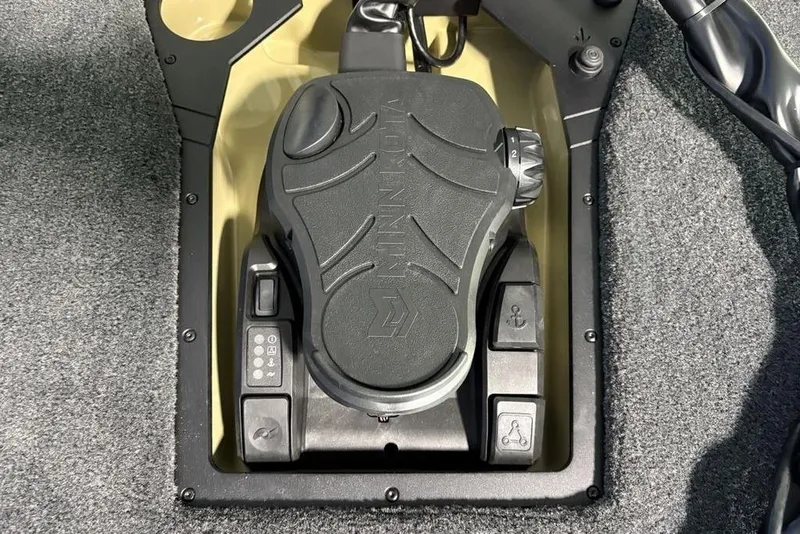 Slide: The Image of 2026 Skeeter ZXE21 boat foot pedal control with various function buttons. - 12
