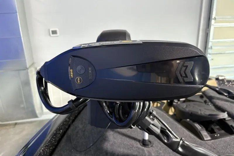 Slide: The Image of 2026 Skeeter ZXE21 boat control panel with advanced features in a garage setting. - 14