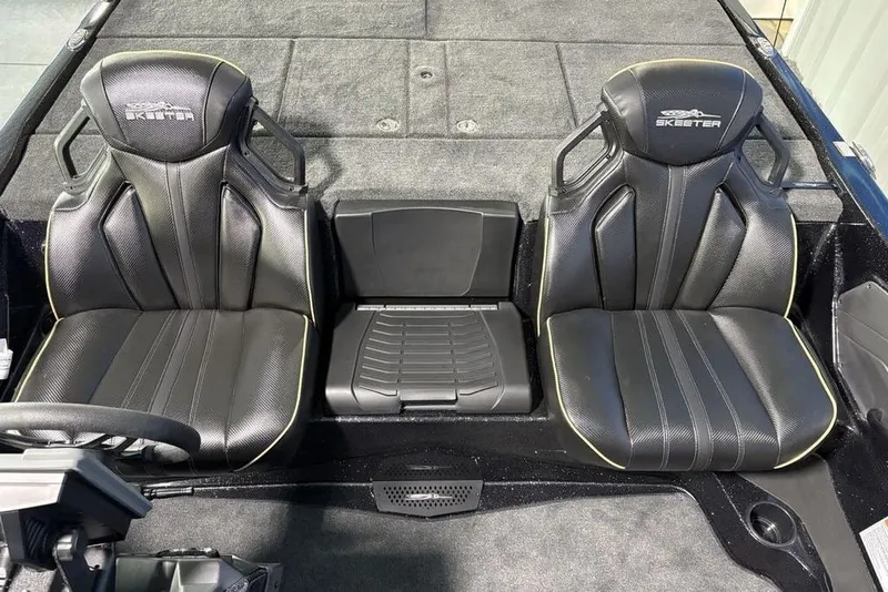 Slide: The Image of 2026 Skeeter ZXE21 boat interior with black leather seats and sleek design. - 20
