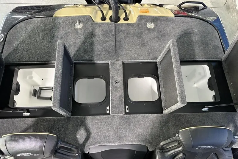 Slide: The Image of 2026 Skeeter ZXE21 boat interior with open storage compartments and seating. - 24