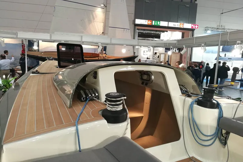 Slide: The Image of 2026 Brenta 30 yacht interior at a boat show, featuring sleek design and modern amenities. - 5