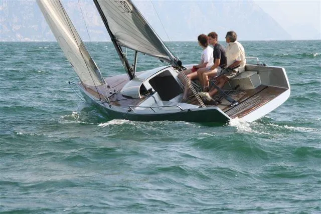 Slide: The Image of Sailing on a 2026 Brenta 30 yacht with three people on board. - 16