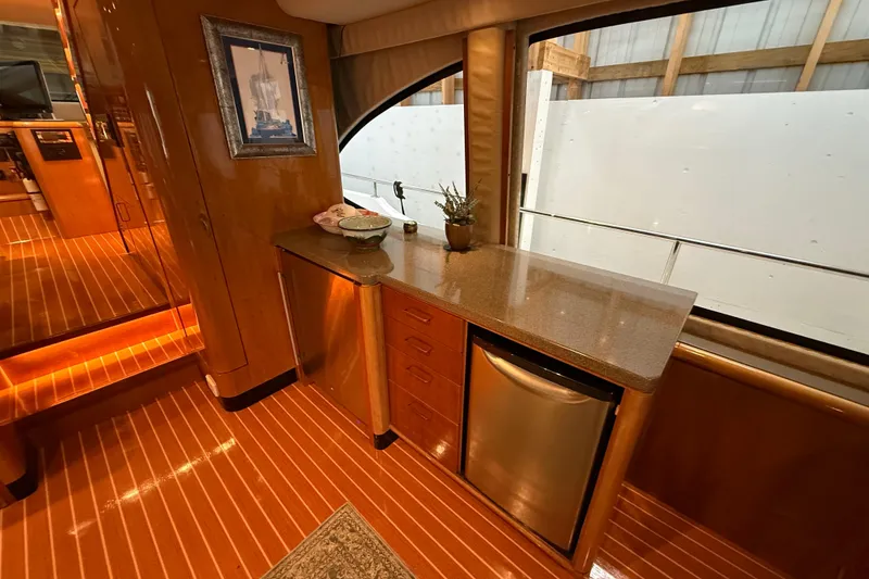 Slide: The Image of Luxurious interior of 2000 Northern Pacific Motor Yacht with cozy seating and elegant decor. - 10