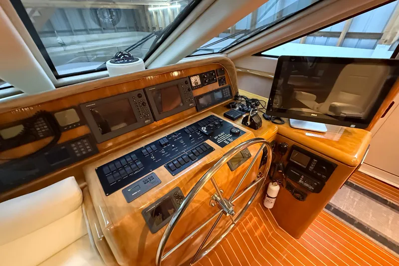 Slide: The Image of Luxurious interior of a 2000 Northern Pacific Motor Yacht with elegant wood finishes and modern amenities. - 26