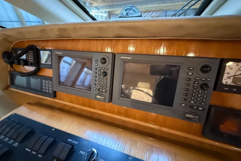 Slide: The Image of Luxurious interior of 2000 Northern Pacific Motor Yacht with illuminated wooden staircase. - 27