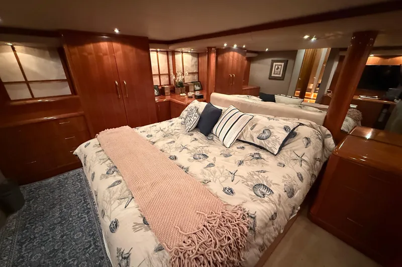 Slide: The Image of Luxurious interior staircase of 2000 Northern Pacific Motor Yacht with elegant lighting. - 36