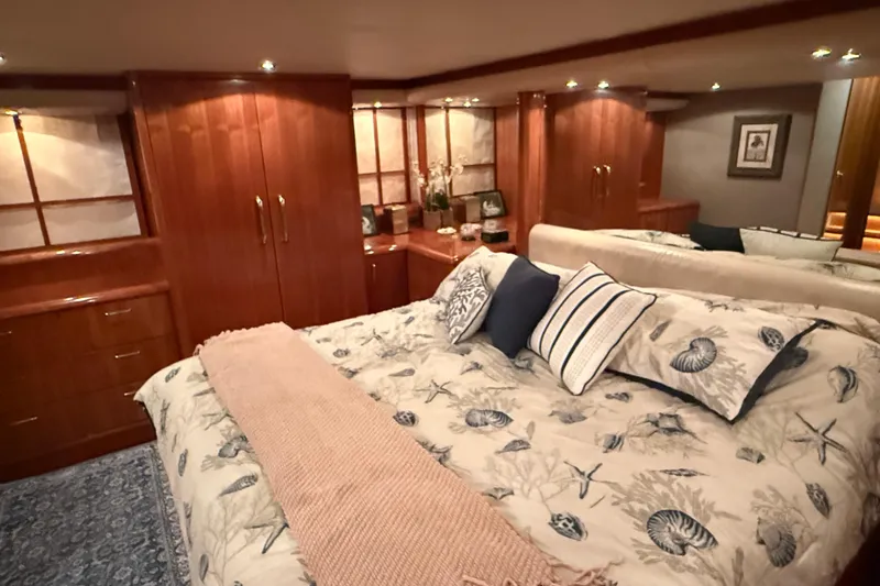Slide: The Image of Luxurious interior of 2000 Northern Pacific Motor Yacht with illuminated wooden staircase. - 37