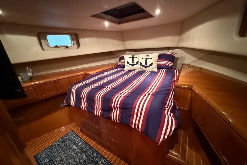 Slide: The Image of Shower area in 2000 Northern Pacific Motor Yacht, featuring handheld showerhead. - 49