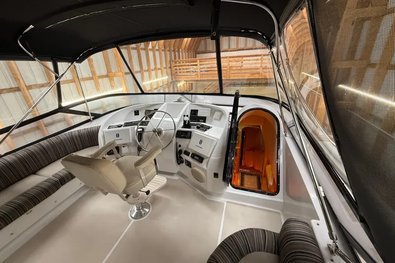 Slide: The Image of Illuminated staircase on 2000 Northern Pacific Motor Yacht, featuring elegant wood and ambient lighting. - 56