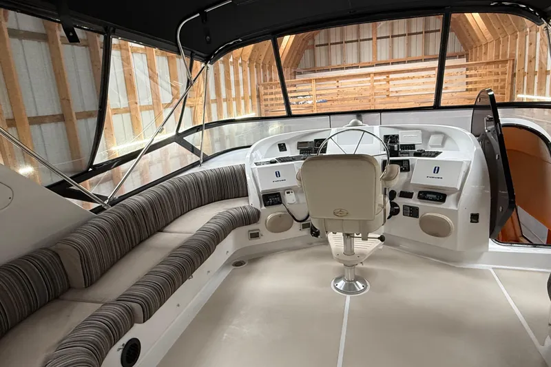 Slide: The Image of Interior of 2000 Northern Pacific Motor Yacht with illuminated wooden staircase and modern decor. - 57