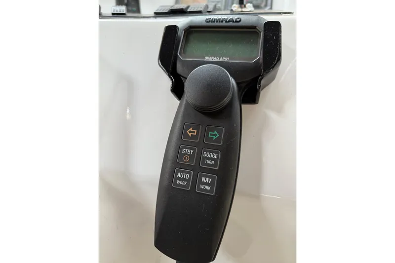 Slide: The Image of Interior view of 2000 Northern Pacific Motor Yacht cockpit with helm and seating. - 60