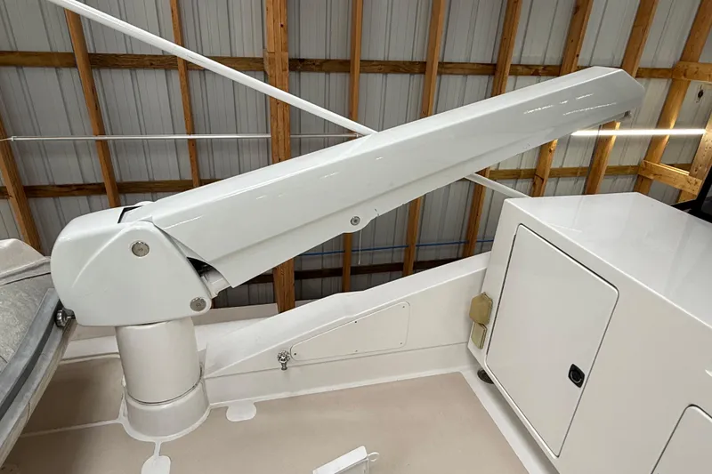 Slide: The Image of Control panel of a 2000 Northern Pacific Motor Yacht with steering wheel and navigation equipment. - 63