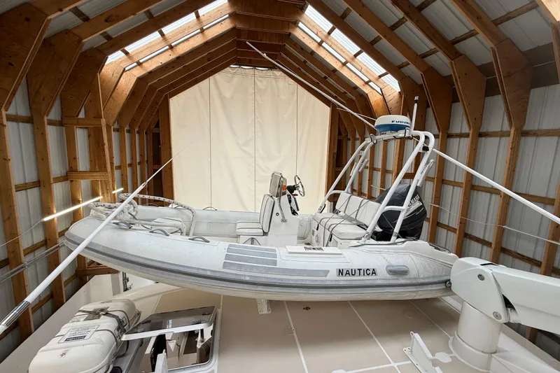 Slide: The Image of Northern Pacific 2000 Motor Yacht under wooden roof structure. - 66