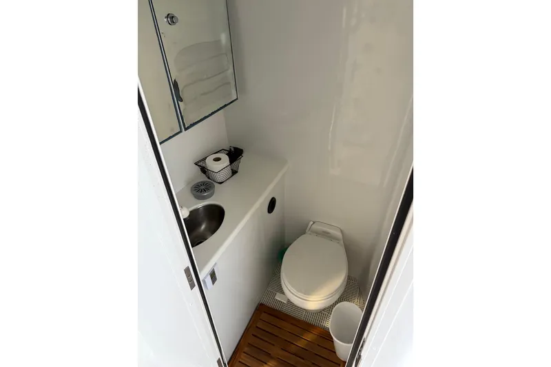 Slide: The Image of Staircase on 2000 Northern Pacific Motor Yacht, featuring teak steps and white exterior. - 75