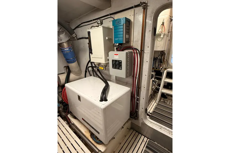 Slide: The Image of Engine room of a 2000 Northern Pacific Motor Yacht with CAT marine power engine. - 88