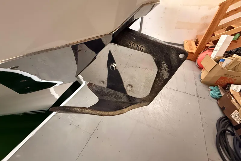 Slide: The Image of Engine room of a 2000 Northern Pacific Motor Yacht, featuring complex machinery and equipment. - 89