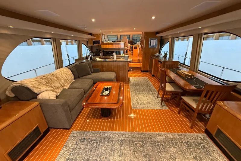 Slide: The Image of Luxurious interior of 2000 Northern Pacific Motor Yacht with elegant furnishings and wood accents. - 98