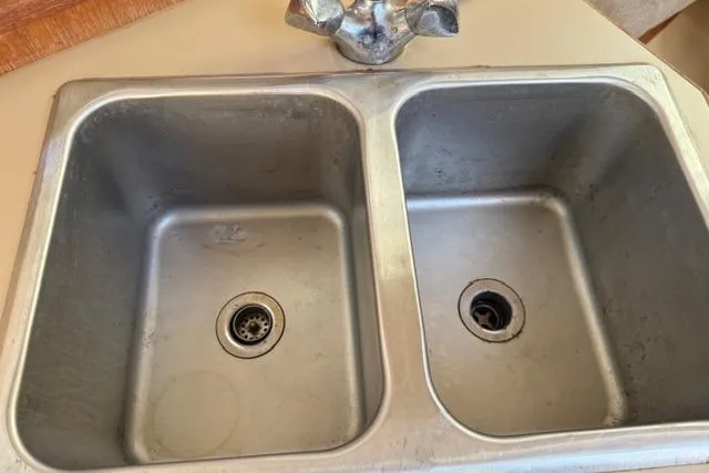 Slide: The Image of Cozy cabin interior of 1989 Hunter 35.5 sailboat with a comfortable bed. - 5