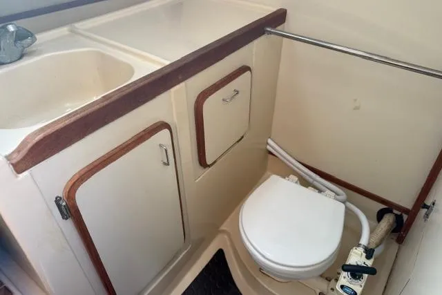 Slide: The Image of Double stainless steel sink in a 1989 Hunter 35.5 model kitchen. - 7