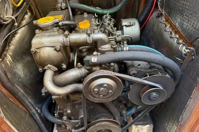 Slide: The Image of Interior of a 1989 Hunter 35.5 sailboat with kitchen and seating area. - 8