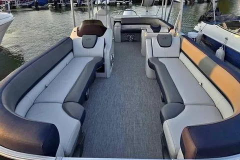 Slide: The Image of 2023 Avalon Catalina Funship 2585 pontoon boat interior with spacious seating and modern design. - 6